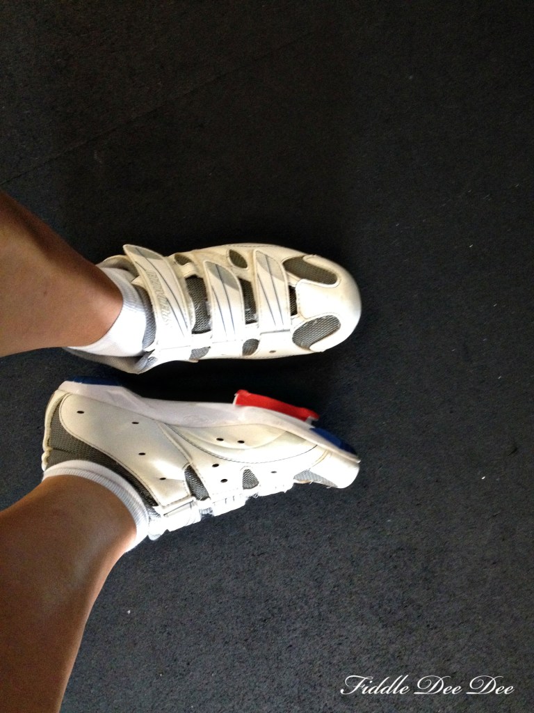 Shoes for spinning are absolutely necessary as they latch onto the bike pedal and keep your foot from slipping off as you are spinning 100 mph!