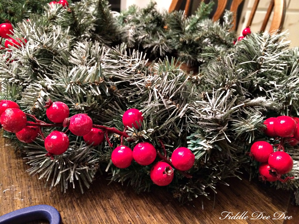 Work from the outside in when framing you wreath with floral picks.  Make sure all of your elements are going the same direction.