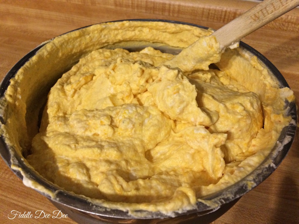 The whipped cream will take on a pretty and festive orange hue.